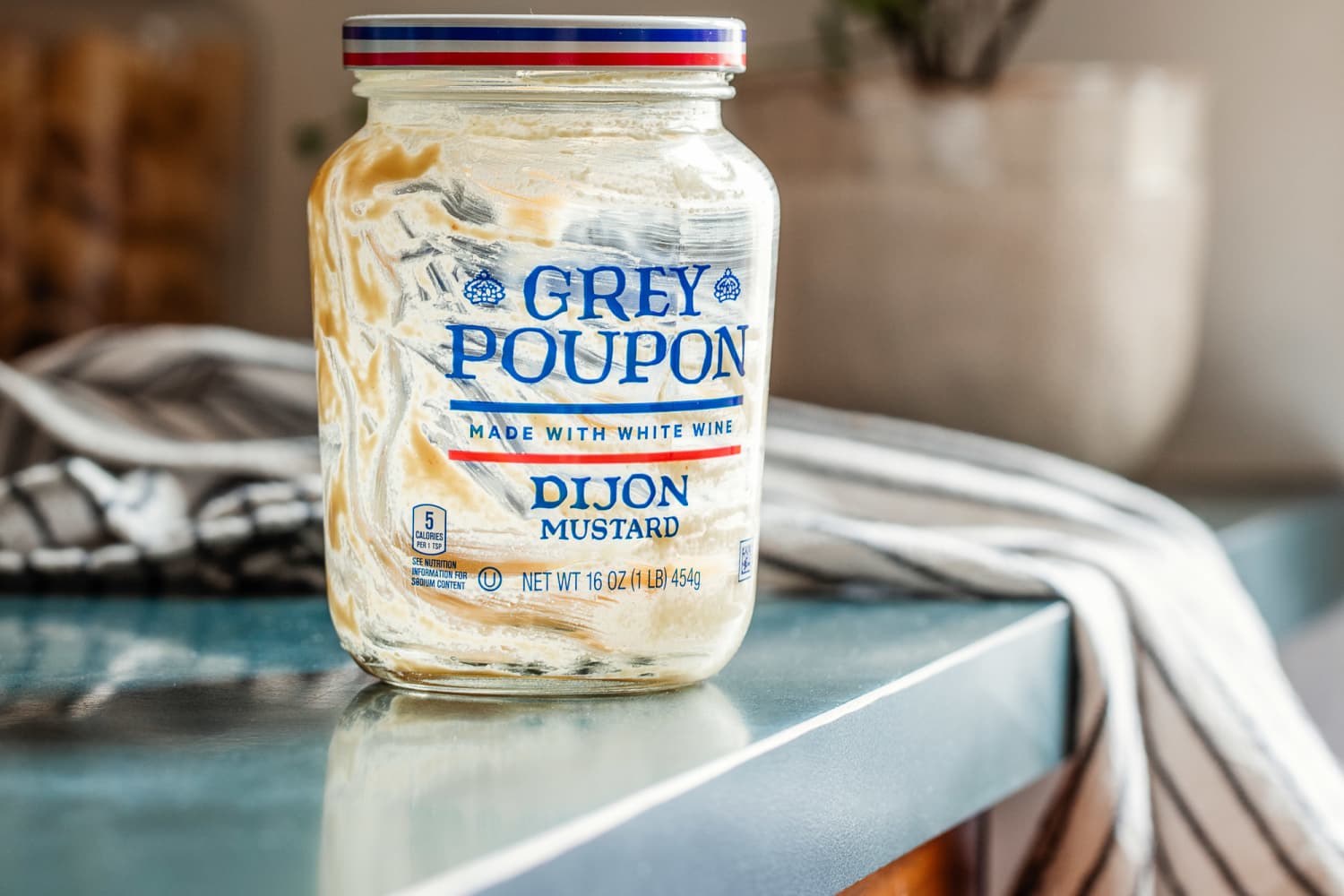 Use an AlmostEmpty Mustard Jar to Make a Vinaigrette The Kitchn